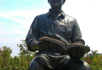 读书雕塑-户外铜雕坐着石头上读书雕塑