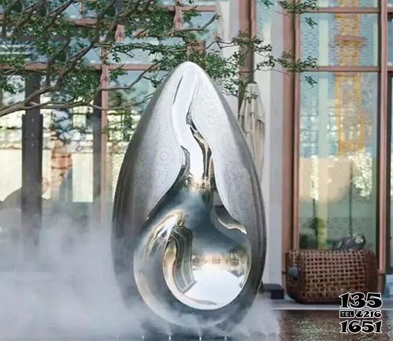 水滴雕塑-庭院池塘创意不锈钢抽象镂空水滴雕塑高清图片