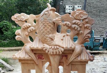 鲤鱼雕塑-庭院摆放的跃龙门的黄蜡石石雕鲤鱼雕塑