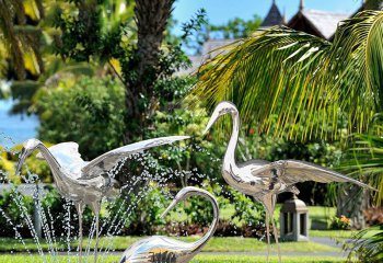 仙鹤雕塑-公园池塘不锈钢喷泉中的仙鹤雕塑