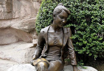 读书雕塑-小区铜雕坐在石头上的女孩读书雕塑