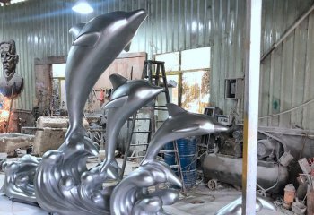 海豚雕塑-海边摆放一群跳跃的不锈钢抽象海豚雕塑