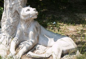 豹子雕塑-公园草坪石头创意休息中的金钱豹雕塑