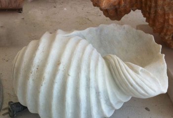 海螺雕塑-湖边摆放的汉白玉石雕创意海螺雕塑