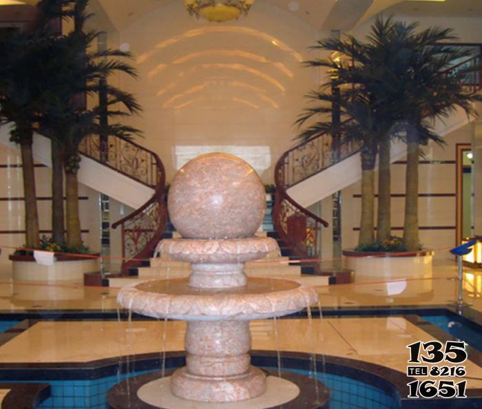 风水球雕塑-酒店室内景观晚霞红风水球喷泉石雕高清图片