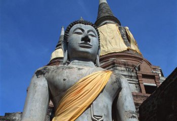 如来佛祖雕塑-城市创意风趣青石石雕坐着的如来佛祖雕塑