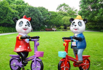 熊猫雕塑-卡通乐园摆放骑车熊猫玻璃钢雕塑