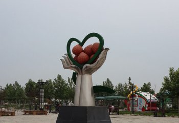 草莓雕塑-公园广场摆放不锈钢手捧草莓雕塑