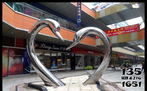 天鹅雕塑-城市创意抽象个性爱心雕塑高清图片