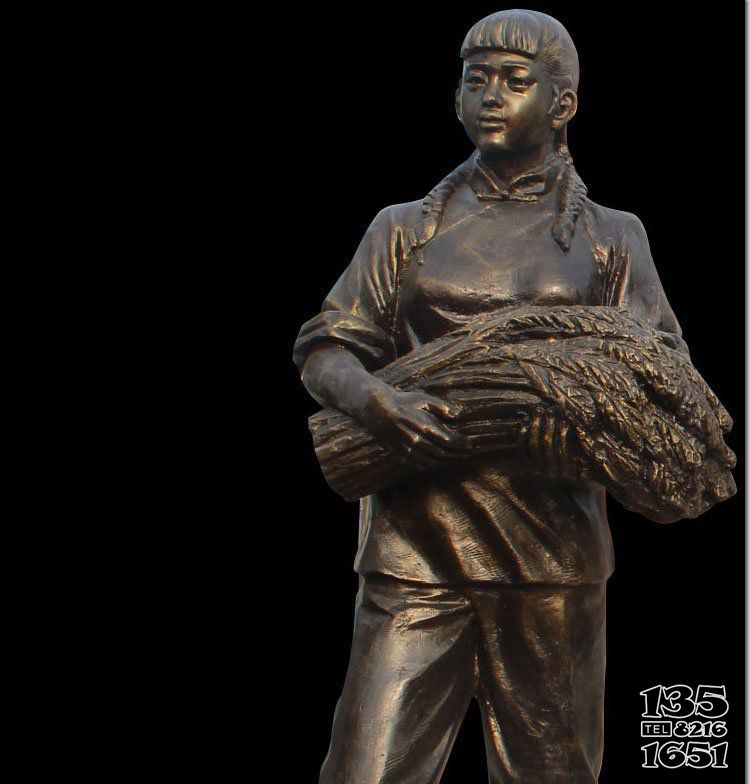 女性雕塑-农场人物铜雕抱着稻穗的女性雕塑高清图片