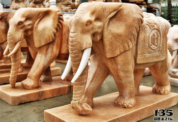 大象雕塑-庭院寺庙晚霞红石雕行走的大象雕塑