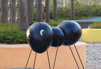 蚂蚁雕塑-体育花园大号黑色脸朝左玻璃钢雕塑