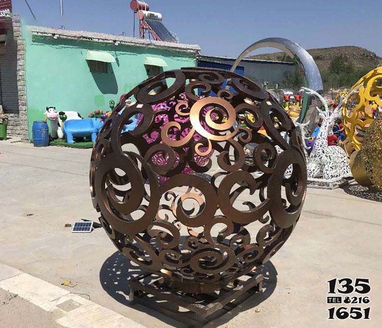 镂空球雕塑-公园户外创意铜铸镂空球雕塑高清图片