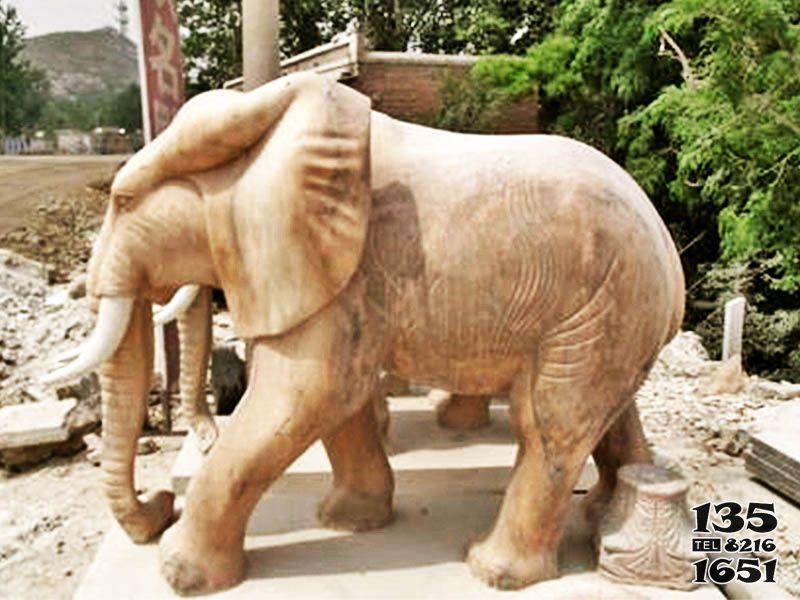大象雕塑-户外园林大象景观装饰品晚霞红石雕大象雕塑高清图片