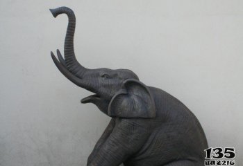 大象雕塑-公园户外一只卧着的铜雕大象雕塑