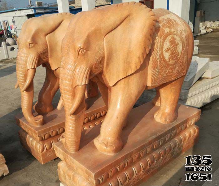 大象雕塑-酒店企业晚霞红石雕如意浮雕大象雕塑高清图片