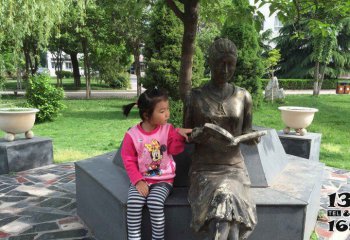 读书雕塑-公园户外坐着树下乘凉的读书雕塑