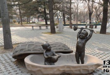 儿童雕塑-景区创意铜雕坐着花生壳里的儿童雕塑