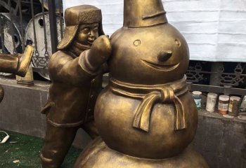 儿童雕塑-景区铜雕戴帽子堆雪人的儿童雕塑