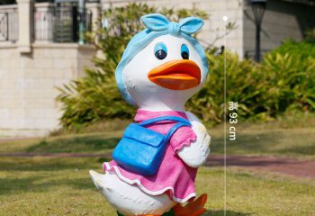 鸭子雕塑-草坪上拿包的母鸭玻璃钢彩绘鸭子雕塑