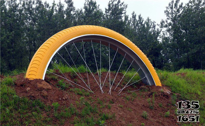 自行车雕塑-彩绘不锈钢自行车轮胎公园景观雕塑高清图片