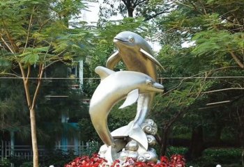 海豚雕塑-花园从中两只不锈钢海豚雕塑