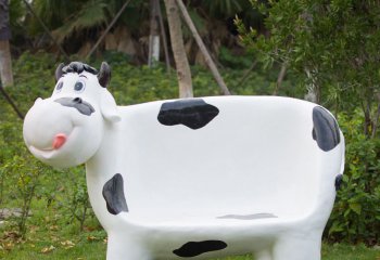 牛雕塑-公园一只卡通奶牛座椅玻璃钢牛雕塑