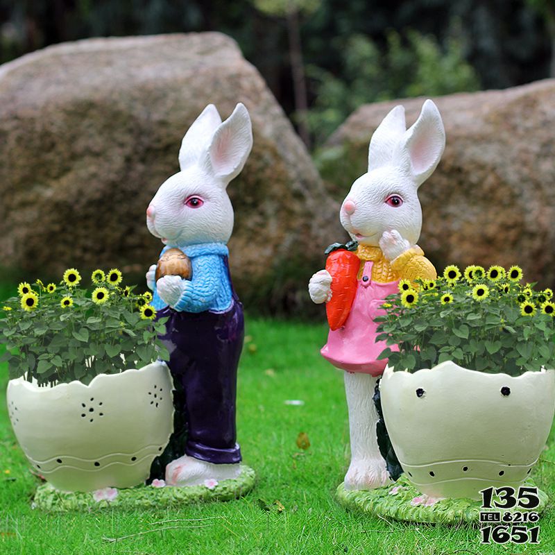 兔子雕塑-电影院两只约会的玻璃钢兔子雕塑高清图片