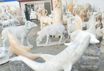海豚雕塑-动物园一只趴着的石雕海豚雕塑
