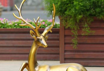 鹿雕塑-公园一只卧着的不锈钢喷漆鹿雕塑