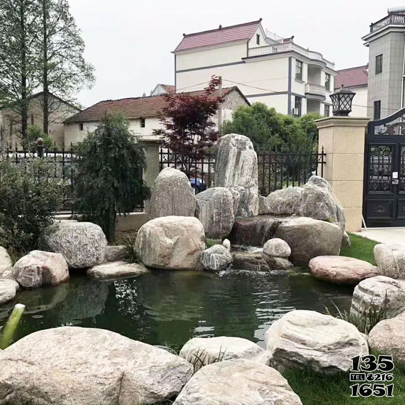 假山雕塑-别墅室外池塘假山石景观高清图片