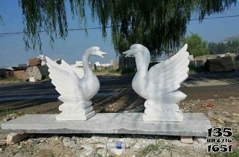 天鹅雕塑-户外景区汉白玉切割创意展翅天鹅雕塑高清图片
