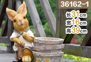 兔子雕塑-动物园摆放一只休息的玻璃钢兔子雕塑
