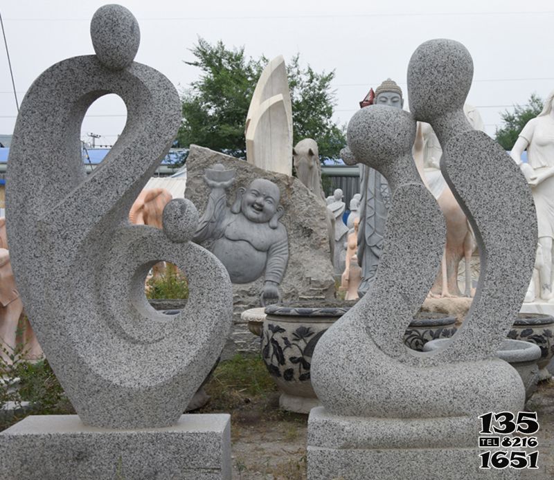 母子雕塑-园林创意花岗岩抽象亲吻母子雕塑高清图片