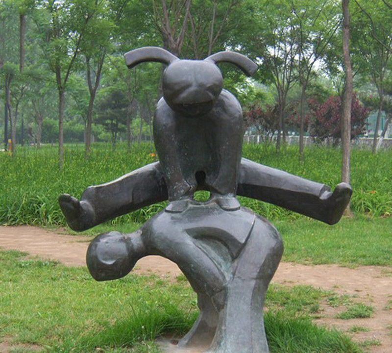 铜雕抽象跳山羊儿童-铜雕跳山羊儿童童趣雕塑高清图片