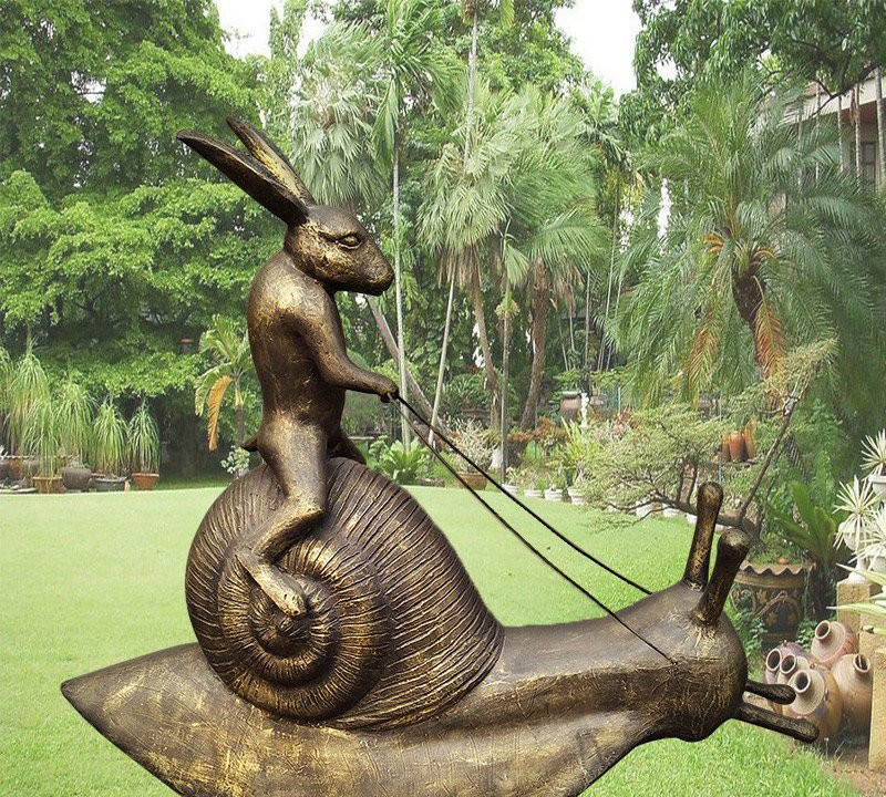 蜗牛牵兔子铜雕-骑蜗牛的兔子铜雕高清图片