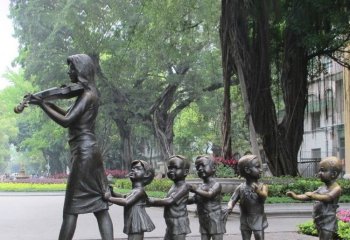 校园拉小提琴的老师和学生铜雕-拉小提琴老师和学生铜雕 校园人物铜雕